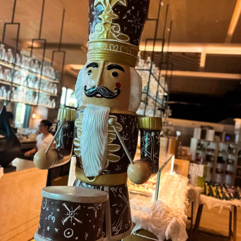 Best chocolate-themed nutcracker decoration in luxury restaurant Christmas setup.