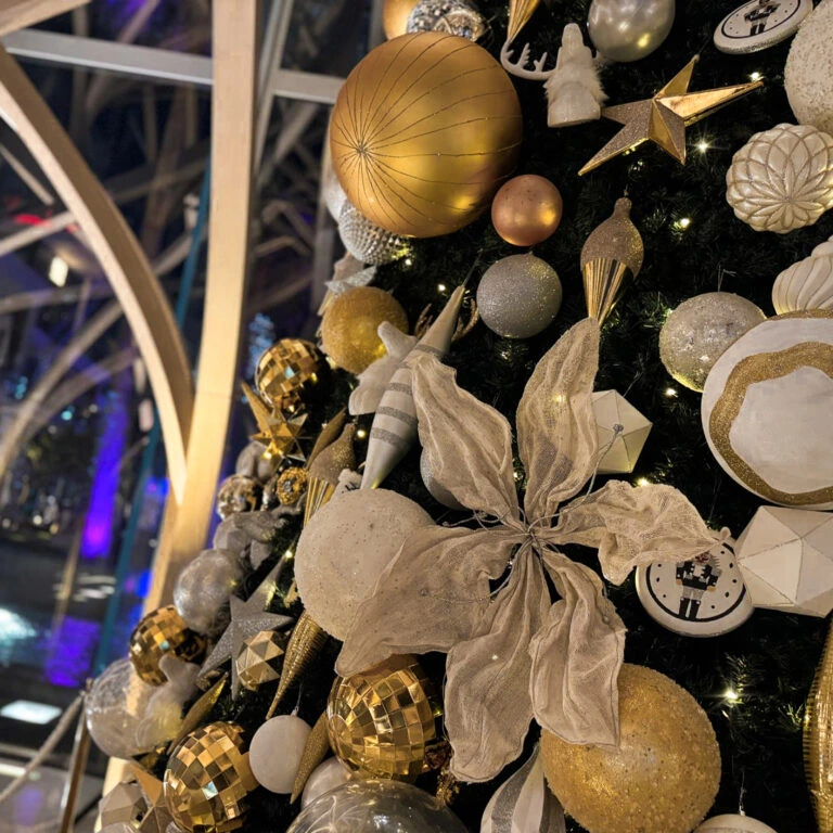 Buy custom gold and silver Christmas ornaments for elegant holiday tree decorations.