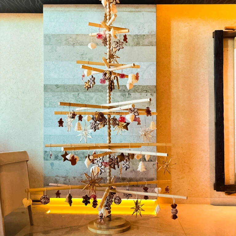Best minimalist wooden Christmas tree with handcrafted ornaments in luxury interior